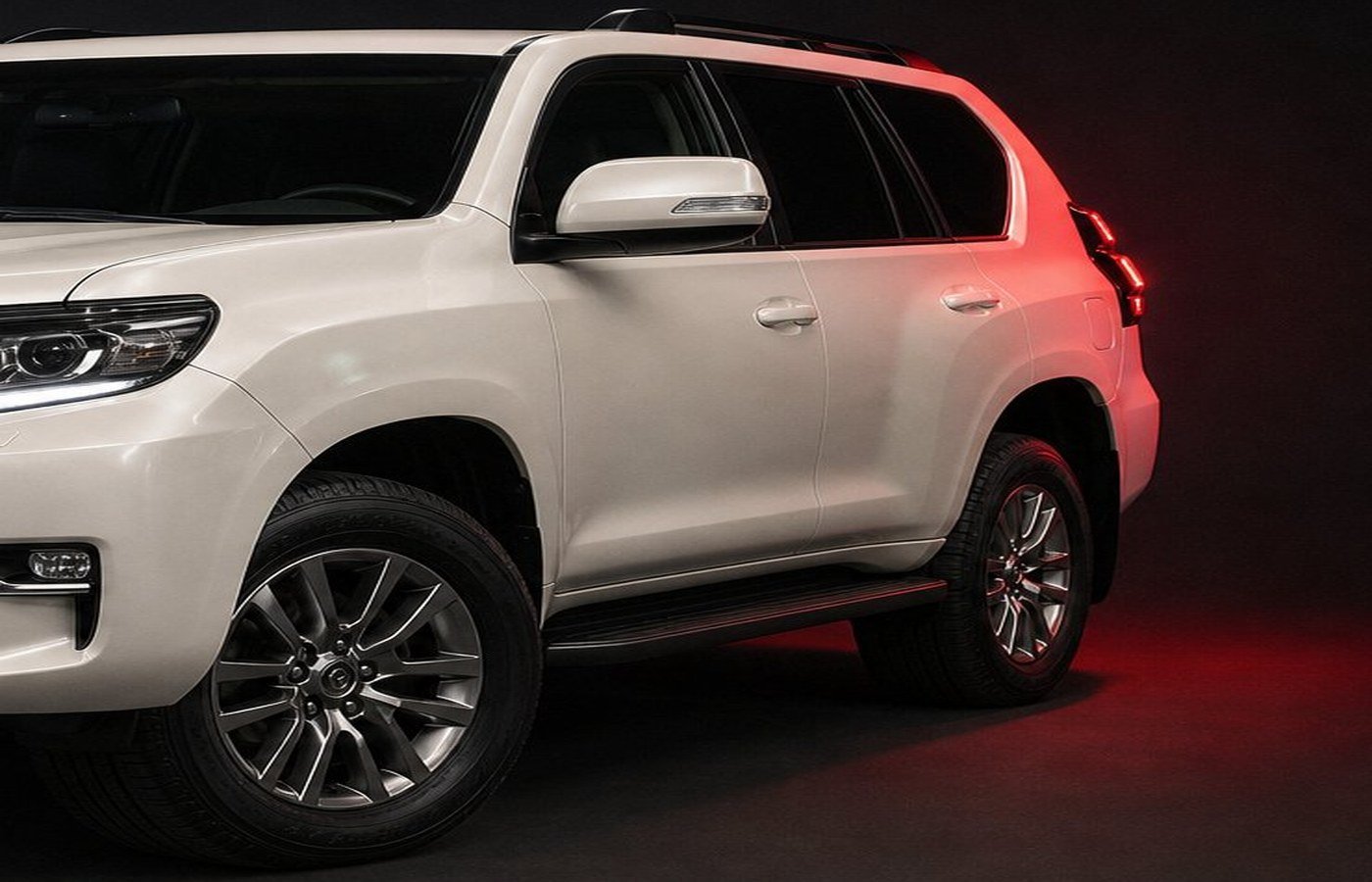 Side view of a detailed white SUV